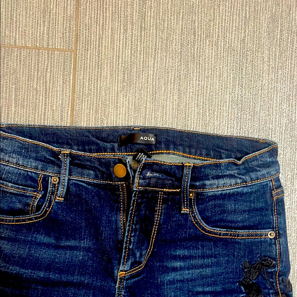 New Aqua jean’s size 25 w black flowering wine embellishments as shown in pics